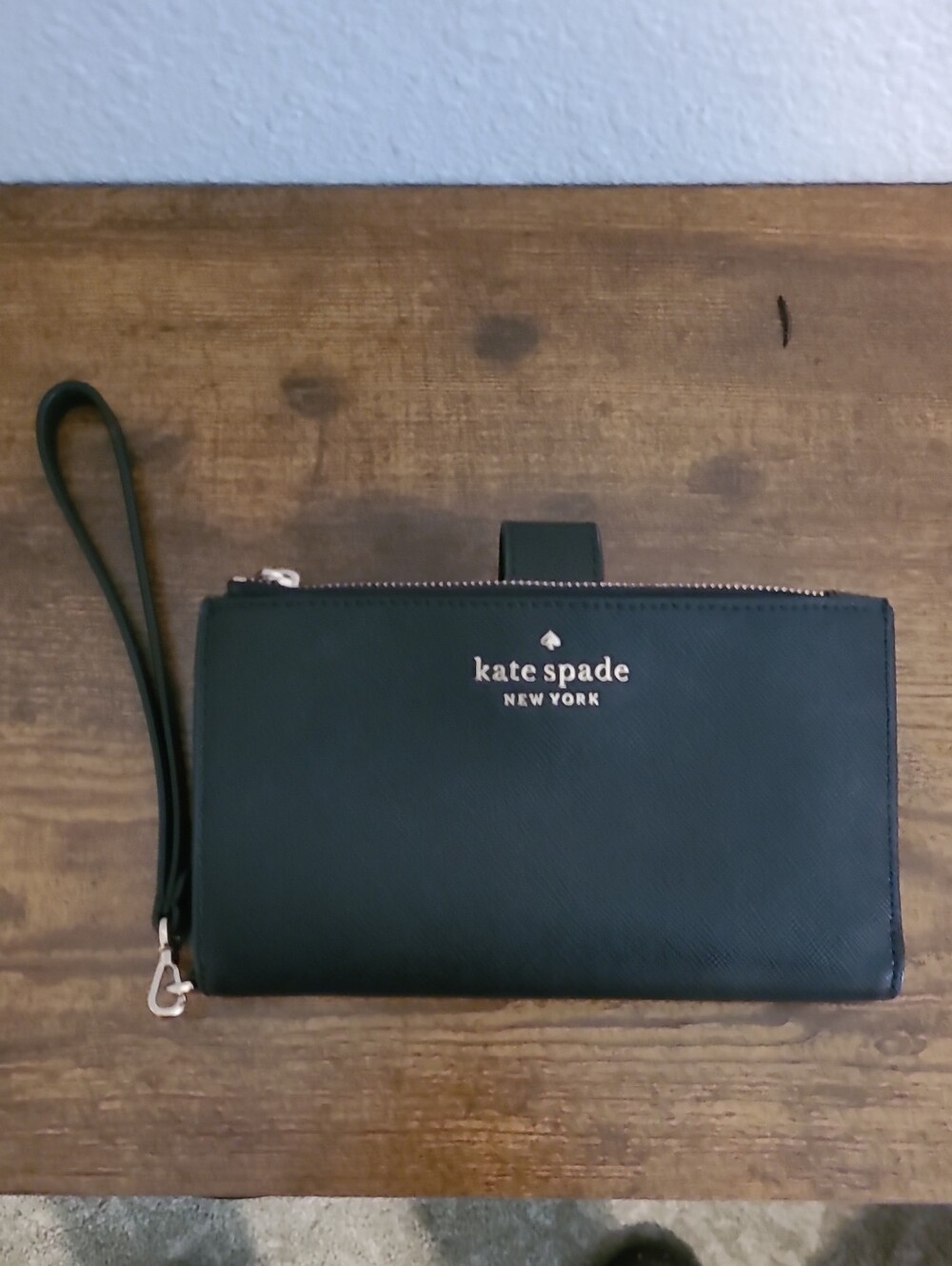 kate spade black wristlet clutch with gold logo